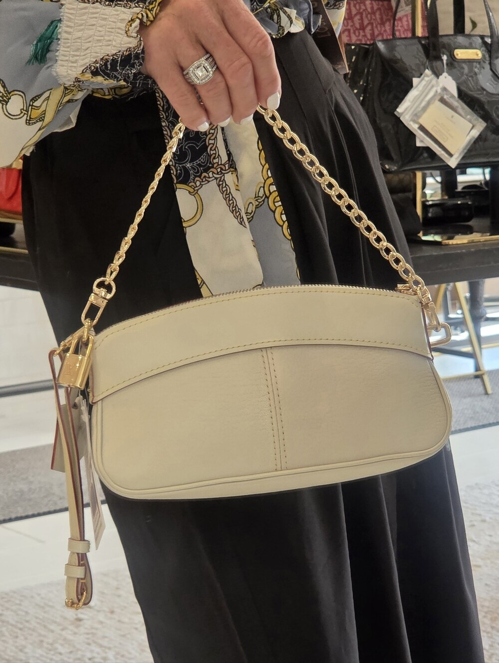 Louis Vuitton baguette/Wristlette Style leather, new condition